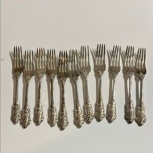 Vintage Silver Flatware Set with Ornate Design